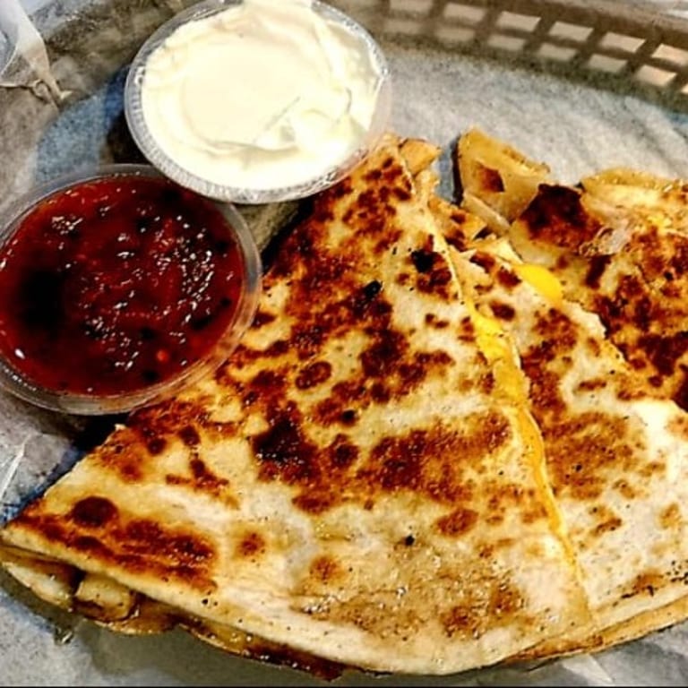 Indulge in Our Quesadilla
